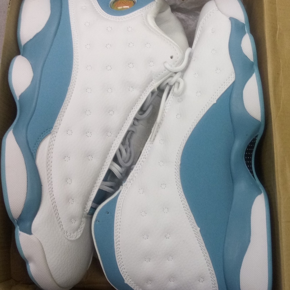 NEW jordan 13 white and columbia blue size 10.5